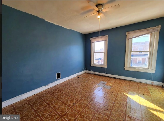 empty room featuring ceiling fan