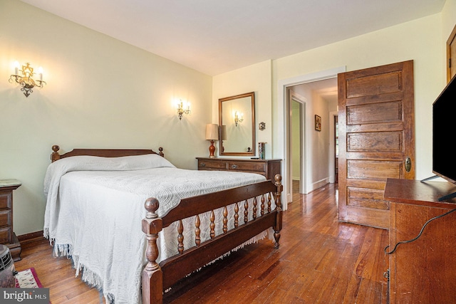 bedroom featuring hardwood / wood-style floors