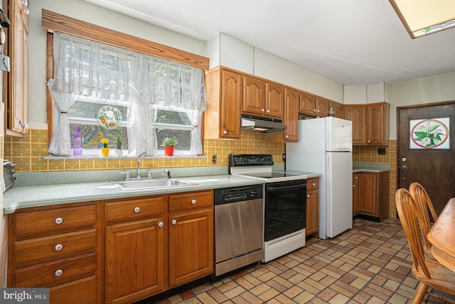 kitchen featuring electric range oven, stainless steel dishwasher, tasteful backsplash, and sink