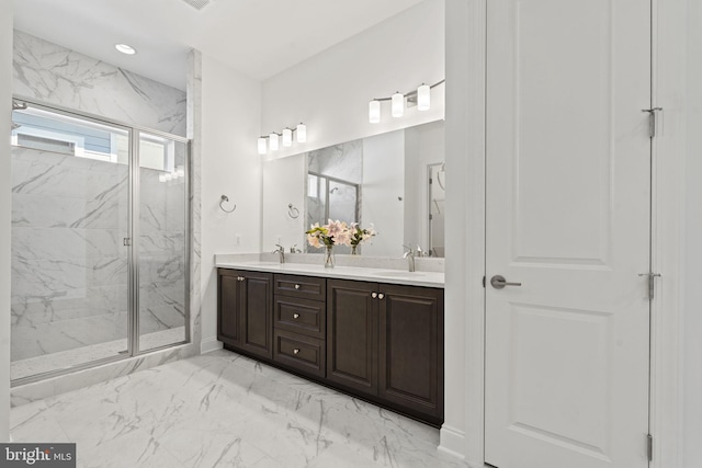 bathroom featuring double vanity, walk in shower, and tile floors