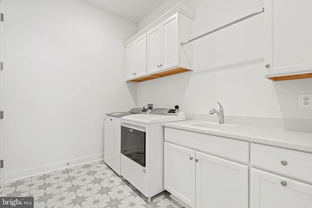 laundry area with independent washer and dryer, hookup for a washing machine, light tile floors, sink, and cabinets