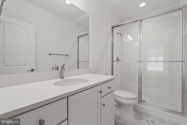 bathroom featuring tile floors, an enclosed shower, toilet, and oversized vanity