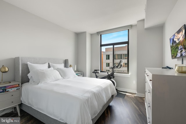 bedroom featuring dark wood-type flooring