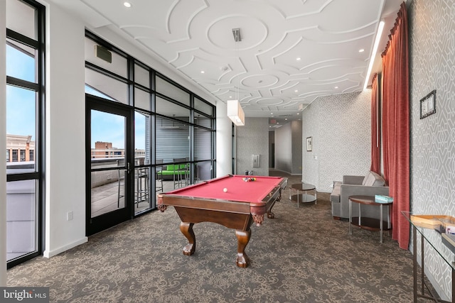 game room with dark carpet, a wall of windows, and pool table