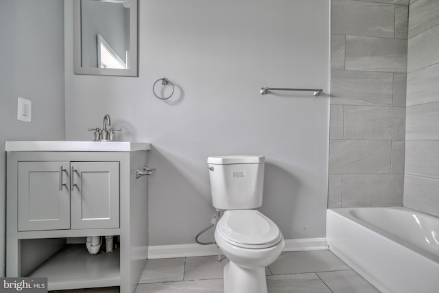 full bathroom with vanity, toilet, and tiled shower / bath