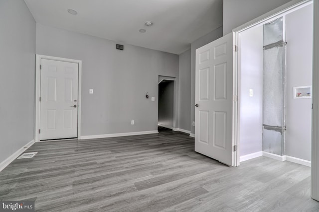 unfurnished bedroom featuring light hardwood / wood-style floors