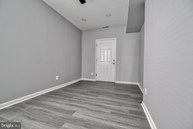 spare room featuring hardwood / wood-style floors