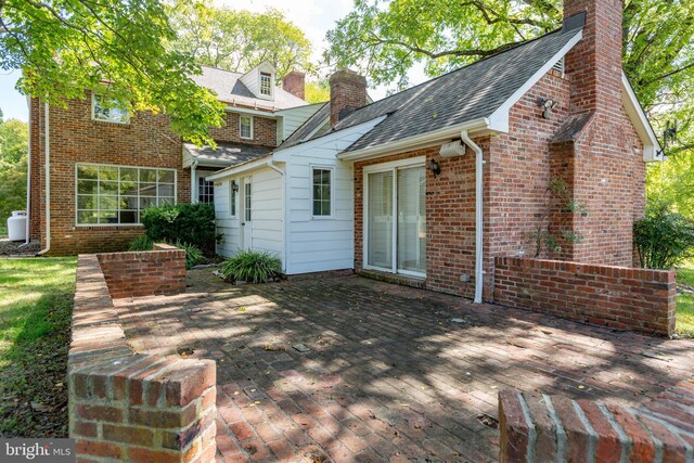 rear view of house with a patio area