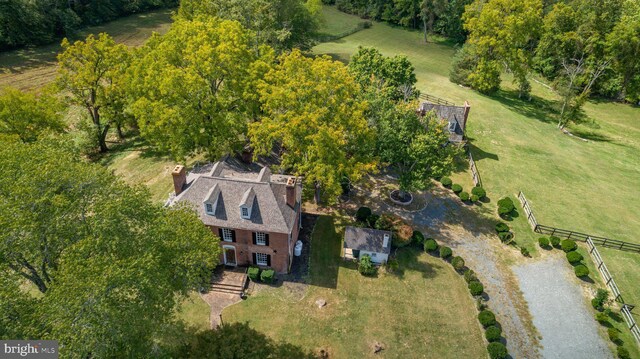 birds eye view of property featuring a rural view