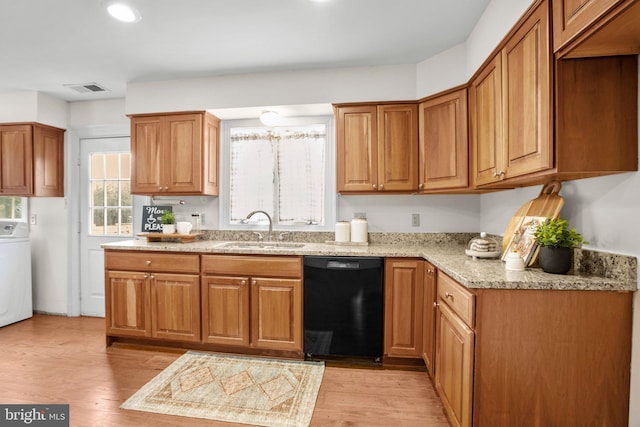 1791 Warrenton Rd, Fredericksburg, VA 22406 - kitchen featuring dishwasher, washer / clothes dryer, light stone countertops, light wood-style floors, and recessed lighting