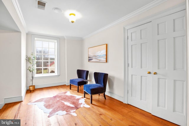 1791 Warrenton Rd, Fredericksburg, VA 22406 - sitting room featuring wood-type flooring and crown molding