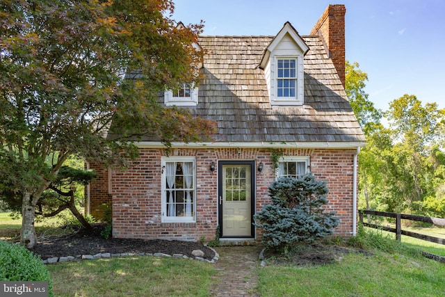 1791 Warrenton Rd, Fredericksburg, VA 22406 - view of front of home with a chimney and brick siding