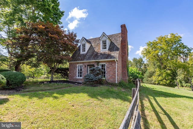 1791 Warrenton Rd, Fredericksburg, VA 22406 - view of side of home featuring brick siding and a chimney