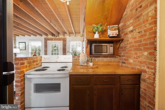 1791 Warrenton Rd, Fredericksburg, VA 22406 - kitchen with white electric stove, stainless steel microwave, open shelves, a wooden ceiling with exposed beams, and brick wall