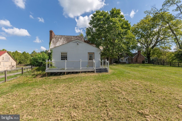 1791 Warrenton Rd, Fredericksburg, VA 22406 - rear view of property with a chimney and a wooden deck