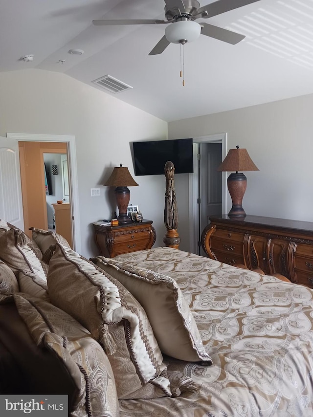 bedroom with ceiling fan and lofted ceiling