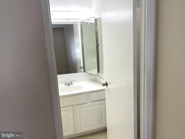 bathroom featuring vanity and tile patterned flooring