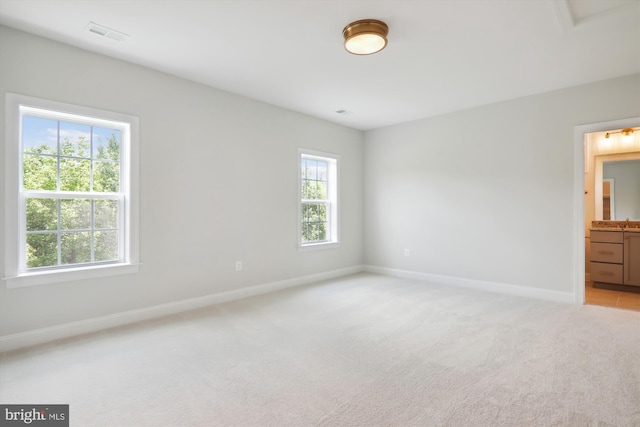 view of carpeted spare room