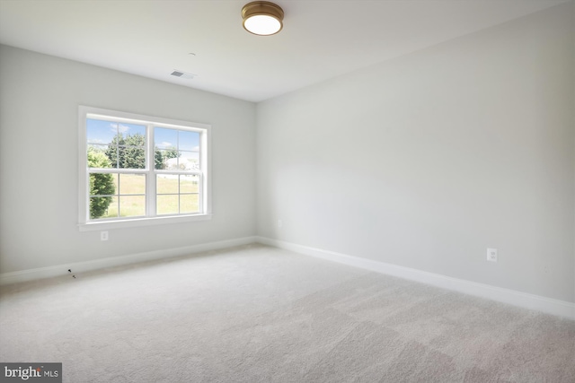 empty room featuring carpet floors