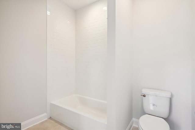 bathroom with shower / bathtub combination, tile patterned floors, and toilet