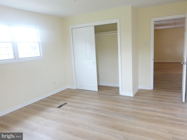 unfurnished bedroom featuring light hardwood / wood-style flooring