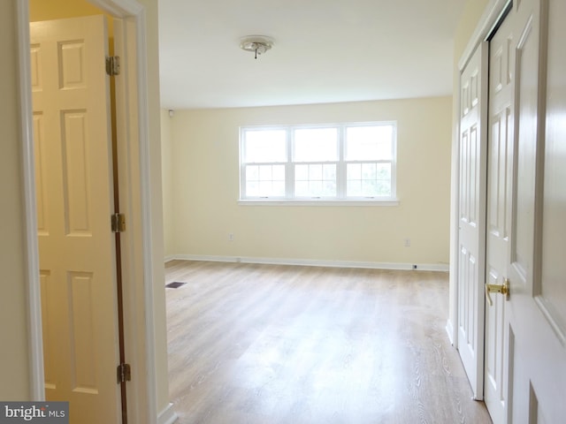 unfurnished bedroom featuring light hardwood / wood-style floors