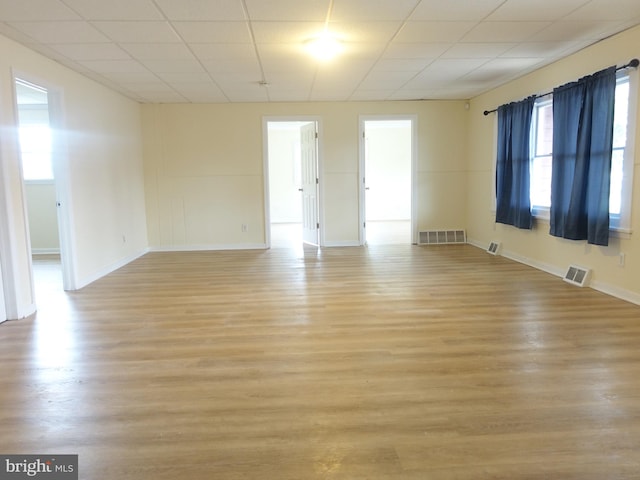 spare room with light wood-type flooring