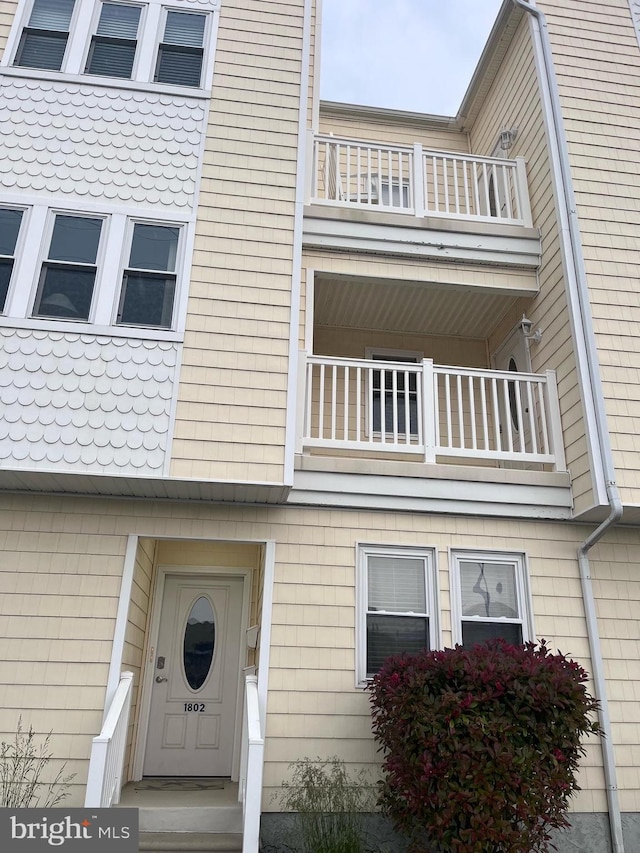 doorway to property with a balcony