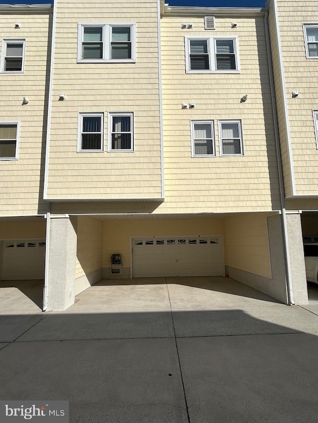 exterior space with a garage