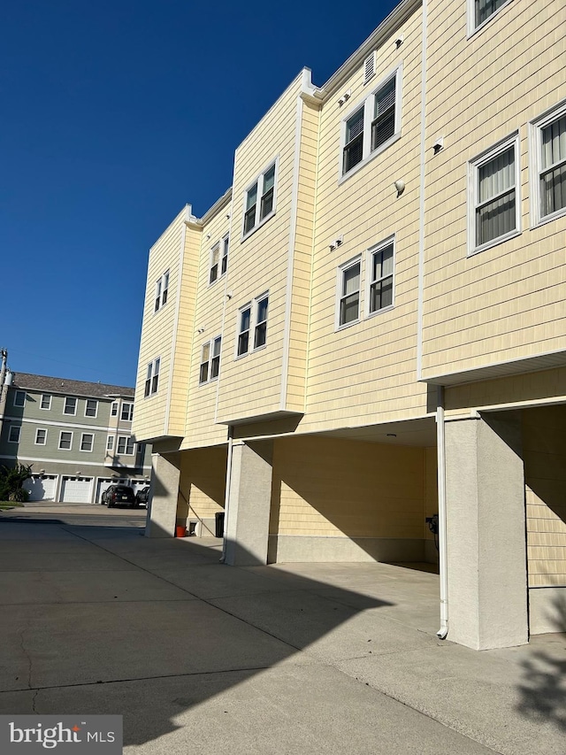 view of building exterior featuring a garage