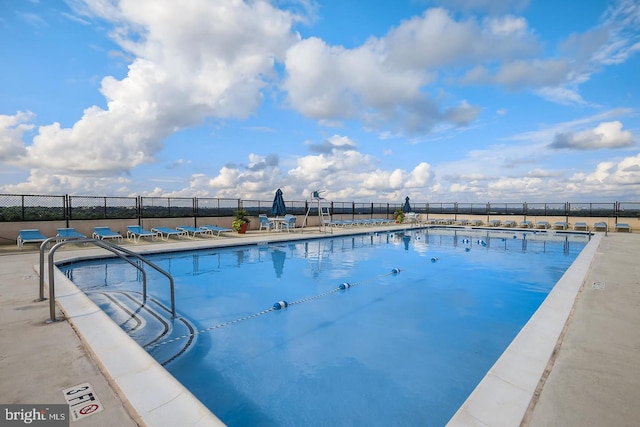 view of pool featuring a patio area