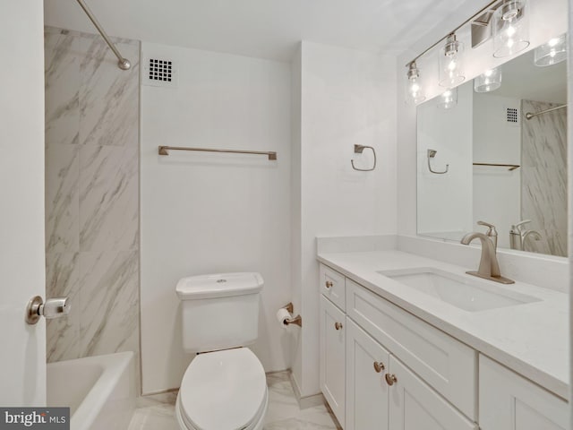 full bathroom with vanity, tiled shower / bath combo, and toilet