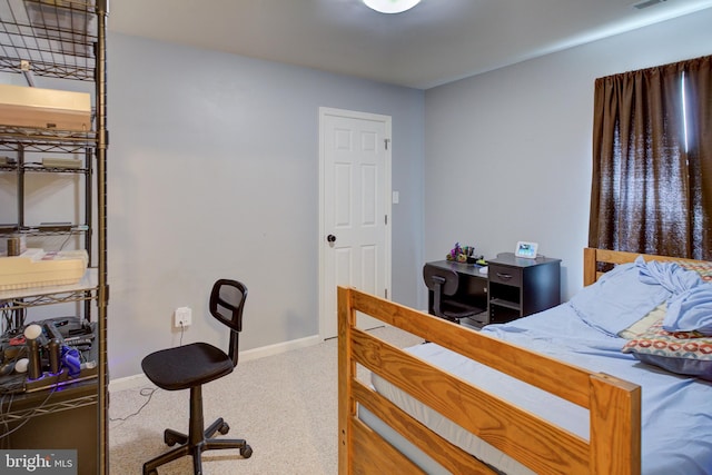 bedroom featuring carpet flooring