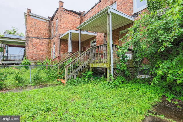 back of house with covered porch