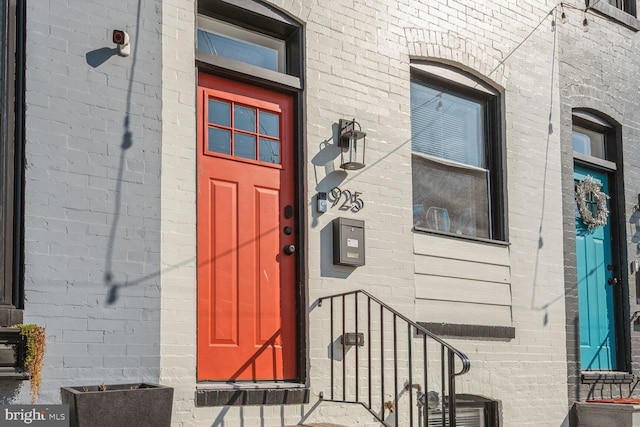 entrance to property with central AC unit