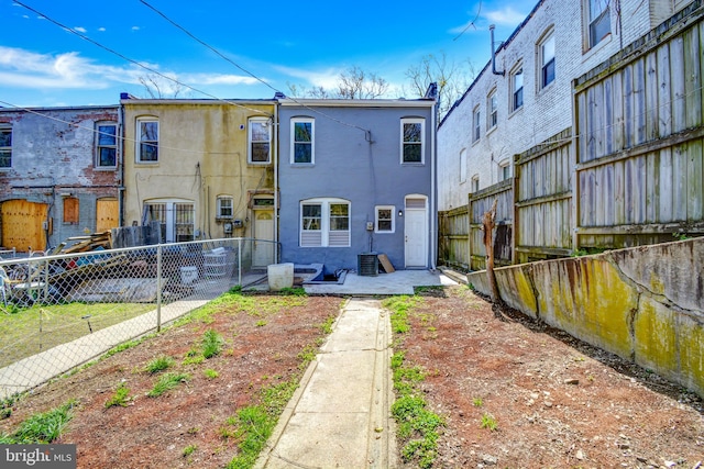 back of house with a patio area