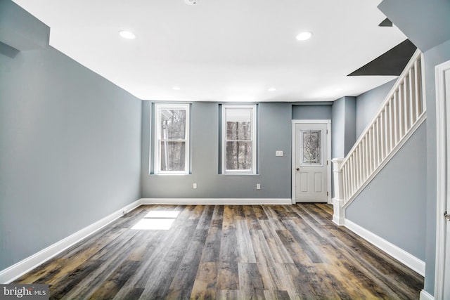 foyer featuring dark wood-type flooring