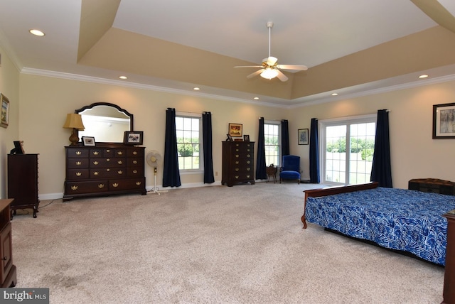 living room featuring ceiling fan, crown molding, and light carpet