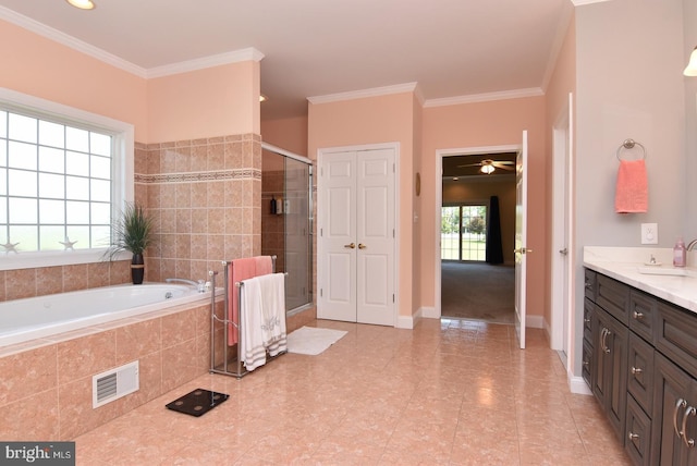 bedroom with light carpet, ceiling fan, and ornamental molding