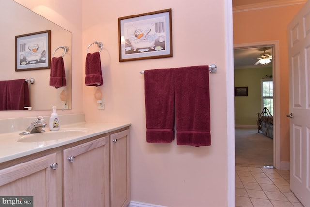 carpeted bedroom featuring crown molding and ceiling fan