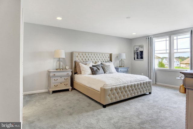 bedroom with light carpet, baseboards, and recessed lighting