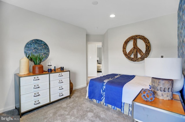 bedroom featuring baseboards, recessed lighting, and light colored carpet