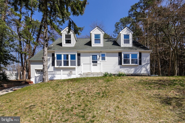 new england style home with a front yard