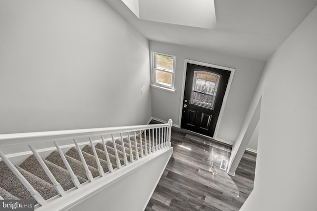 entrance foyer featuring dark hardwood / wood-style floors