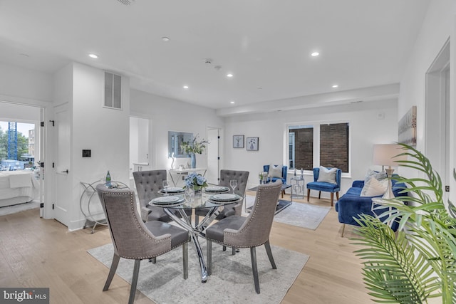 dining room with light hardwood / wood-style floors