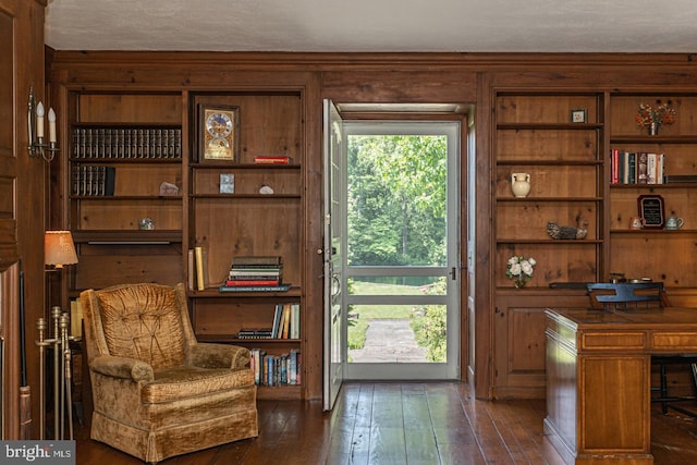 living area with dark wood-type flooring