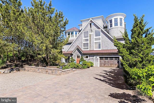 view of front of home with a garage