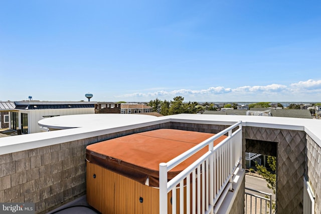 exterior space featuring a hot tub