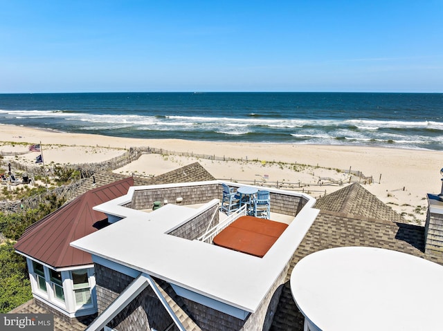 aerial view featuring a beach view and a water view