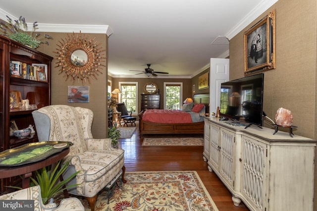 bedroom with dark hardwood / wood-style floors and ornamental molding